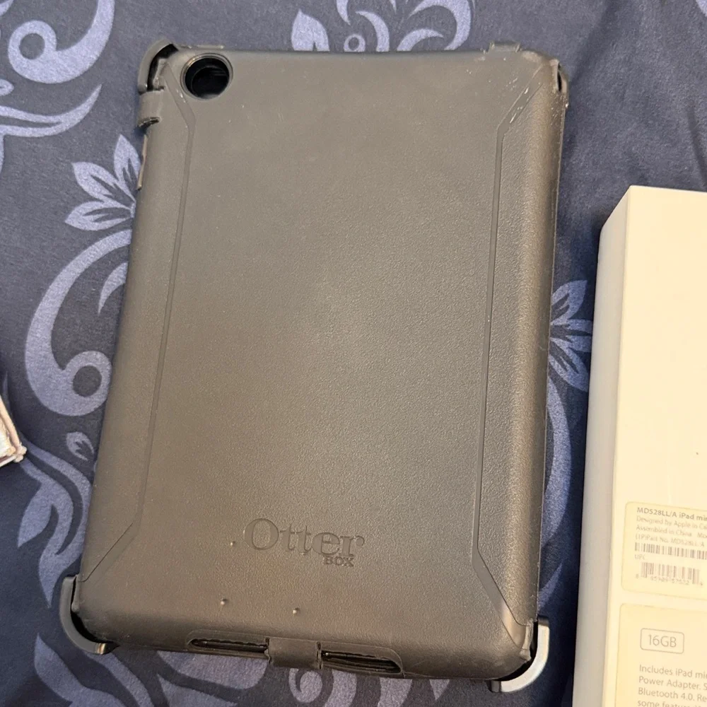 Black Tablet with Silver Trim 16gb Apple IPad mini comes with an otter box case